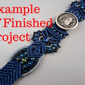 May include: A blue and silver bracelet with a silver charm featuring an elephant. The bracelet is made with a knotting technique and has iridescent beads.