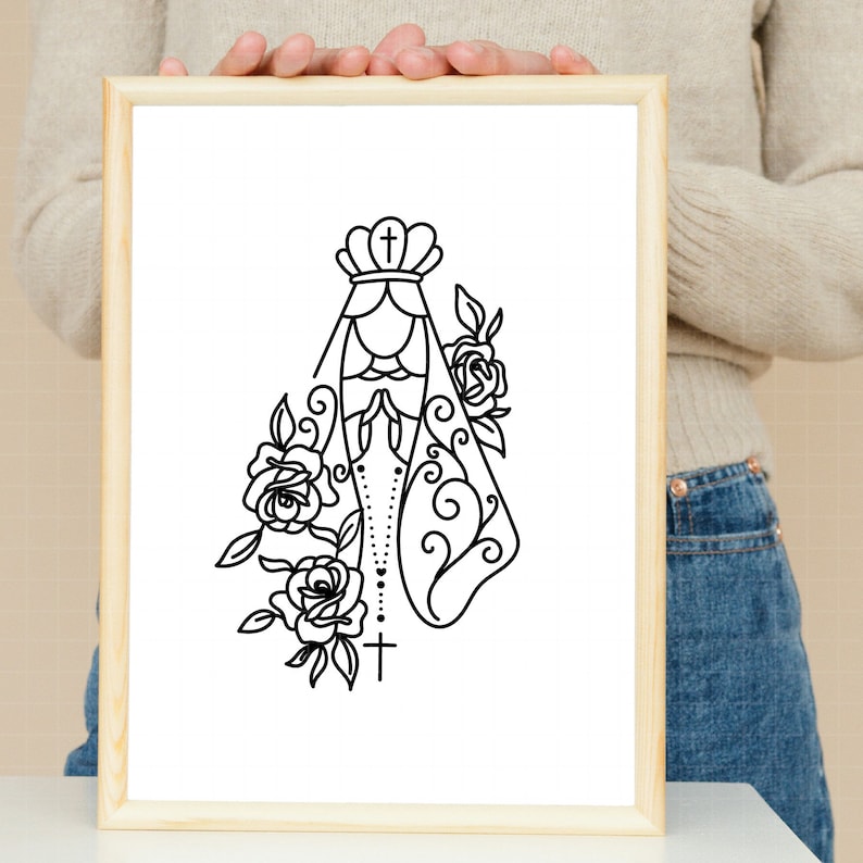 May include: A black and white line drawing of the Virgin Mary in a crown with a rosary and flowers.