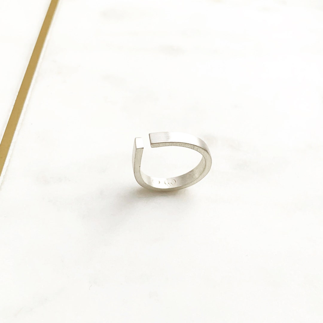 Bungsa Orecchini ad anello Con anello in metallo Argento Acciaio