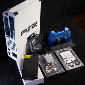 Custom PlayStation 2 + 2Tb and 500Gb HDDs with Blue Controller, 32Mb Memory card, OPL and FMCB