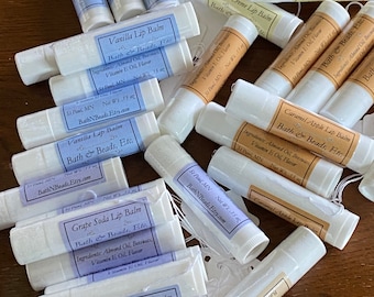 Wholesale Lot of 25 Lip Balms Vanilla, Butter Creme, Rootbeer, Lemon, Spearmint, Grape Soda, Caramel Apple, & Cherry Kiss