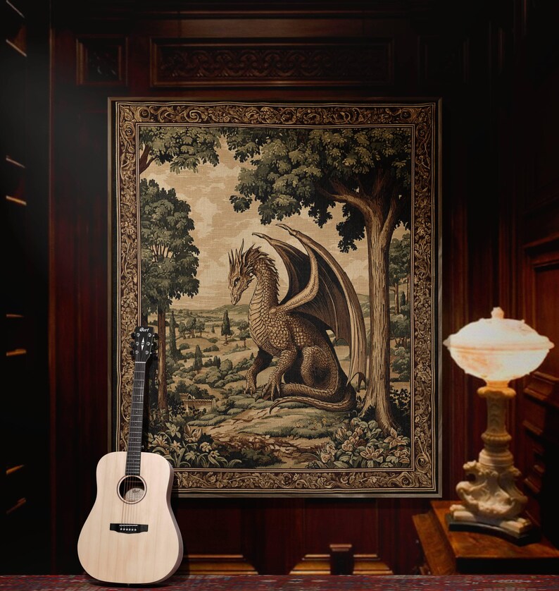 May include: Acoustic guitar leaning against a tapestry featuring a dragon in a landscape scene. The tapestry is framed and hangs on a dark wood paneled wall. A decorative lamp with a cream-colored shade sits on a table.