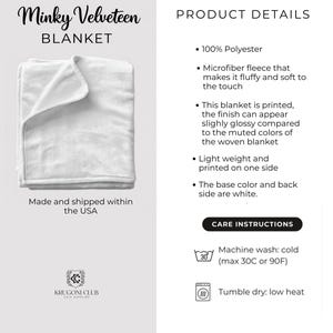 May include: A white Minky Velveteen blanket, folded neatly. The blanket is made of 100% polyester microfiber fleece, printed on one side. The care instructions indicate machine wash cold and tumble dry low heat.