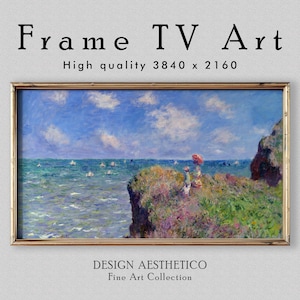 Może przedstawiać: Oprawiony obraz krajobrazu przedstawiający scenę nadmorską z błękitnym niebem i białymi chmurami. Dzieło przedstawia klif z postaciami i czerwonym parasolem z widokiem na ocean z żaglówkami. Tekst "Frame TV Art" i "High quality 3840 x 2160" znajduje się na górze.