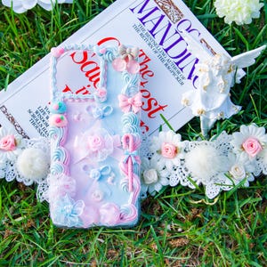 Handmade Pastel Decoden Phone Case: Pink Blue Swirl with Bows