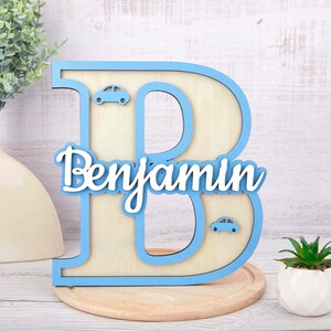 May include: A rustic wooden sign with the text "Welcome to our home" in a handwritten style. The sign is rectangular, with a distressed finish, and features a simple, inviting design. It's suitable for indoor or outdoor use.
