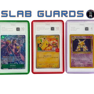 May include: Image of three graded trading cards in protective cases. The cards feature colorful artwork and are encased in green, red, and purple frames. The text "SLAB GUARDS" is displayed above the cards.