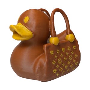Mini purse-themed duck collectible for glam lovers