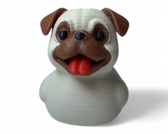 May include: A white rubber duck with a brown and white pug face. The duck has a red tongue sticking out.