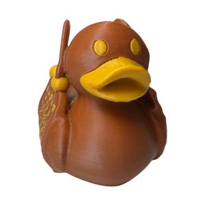Purse Duck styled like a luxury handbag with gold buckle detail