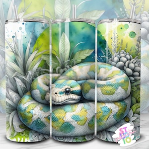 May include: A stainless steel tumbler with a green and blue snake wrapped around it. The snake is surrounded by green and white foliage. The tumbler is a great way to keep your drinks cold or hot.