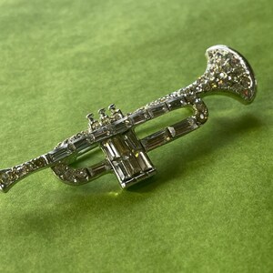 Silvertone Rhinestone Trumpet Brooch