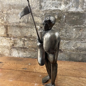 Brutalist Metal Soldier Figure
