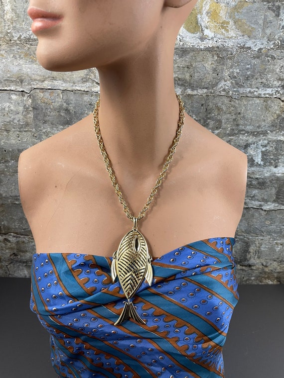 Fish pendant deals