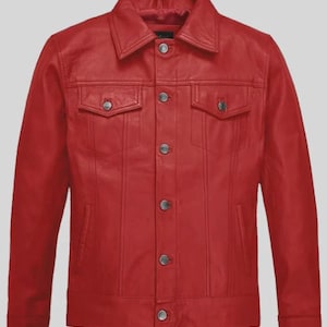 May include: A vibrant red leather jacket with a classic collar and button-down closure. The jacket features two chest pockets and two side pockets. The jacket has a tailored fit and is made of high-quality leather.