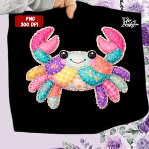 May include: A colorful crab design with a patchwork pattern in pink, blue, yellow, and purple. The crab has a smiling face and is set against a black background. The image includes the text "PNG 300 DPI".