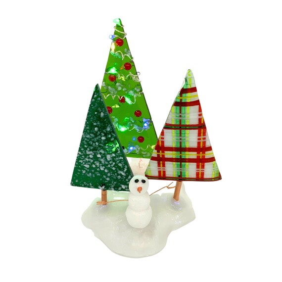 Three fused Christmas trees with snowman