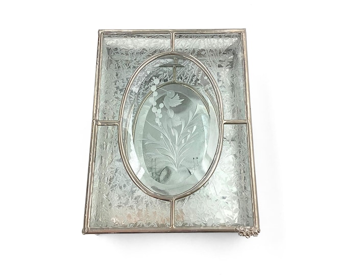 Glass jewelry box with bird on a bevel