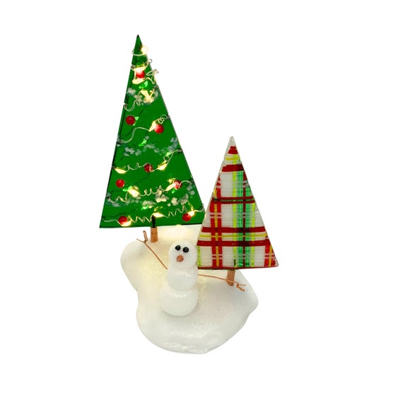 Two fused Christmas trees with snowman
