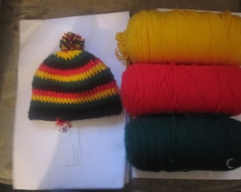 Rasta babymutsje 12-18 mnd rood goudgeel groene strepen