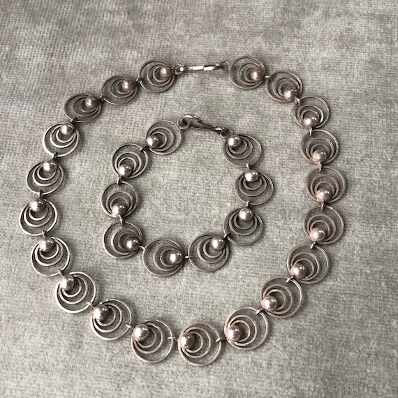 Silver Necklace and Bracelet Set