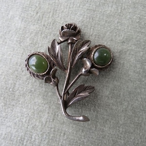Floral Brooch with Dark Green Jadelike Cabochons