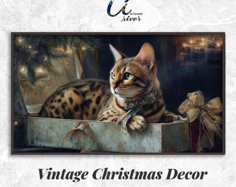 May include: A framed digital art print featuring a Bengal cat with a spotted coat, wearing a decorative collar, and resting in a vintage box. The artwork has a Christmas theme with a bow and the text "Vintage Christmas Decor".
