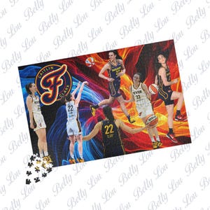 May include: A jigsaw puzzle featuring multiple images of a basketball player wearing a white and navy jersey with the number 22, set against a vibrant red, orange, and blue abstract background, including a circular logo with the text Caitlin Clark.