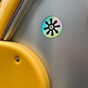 Holografisk Splat-vinylklistermärke: Ding-skydd (5 cm)