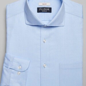 May include: A light blue dress shirt with a slim fit. The shirt has a button-down collar, a pocket on the left side, and a Jos. A. Bank Reserve label on the collar.