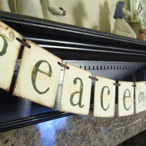 Decorazioni natalizie PACE sulla TERRA Banner Sign
