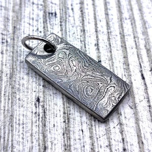 Stainless Damascus Steel Pendant: Viking Warrior Waves Pattern
