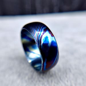 Colorful Titanium Damascus Wedding Ring: Striped Mokuti Style, Timascus band