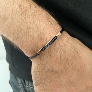 Men&#39;s Black Stainless Steel Cable Bracelet with Bronze Accent