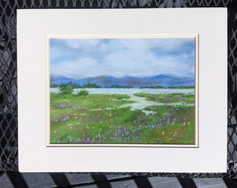 Springtime in Montana,Pastel painting, Nine pipes, spring run off, Blue sky, green trees, purple flowers, 11 X 14 image, White mat