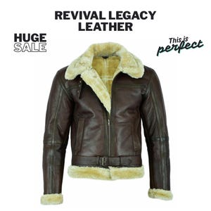 Puede incluir: Chaqueta de cuero marrón con cuello y forro de borrego color crema. La chaqueta tiene cierre de cremallera, cinturón en la cintura y el texto "REVIVAL LEGACY LEATHER". También se ven las palabras "HUGE SALE".