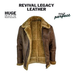 May include: A brown leather jacket with a shearling lining and collar. The jacket has a zipper closure and a classic aviator style. The text "REVIVAL LEGACY LEATHER" is at the top, and "HUGE SALE" is in the upper left corner.
