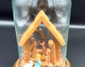 Vintage nativity scene under glass wood/plastic/wood base
