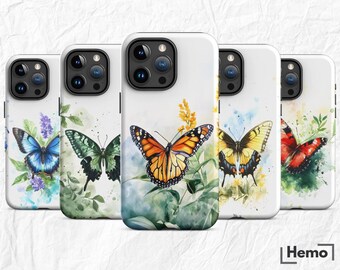 May include: A collection of white phone cases featuring watercolor butterfly designs. Each case showcases a different butterfly species in vibrant colors, set against a backdrop of floral and botanical elements. The cases are arranged in a row, displaying the variety of designs.