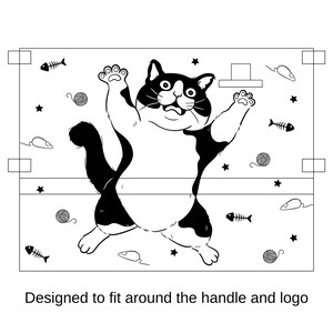 May include: Black and white illustration of a cat with a surprised expression, surrounded by various cat toys, including yarn balls, fish bones, and mice. The image is designed to fit around the handle and logo of a product.