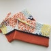 see more listings in the fold over clutches section