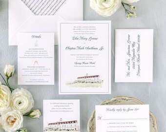 May include: Elegant wedding invitation suite featuring white stationery with navy accents and floral arrangements. The suite includes an invitation, RSVP card, details card, and envelope, all with a watercolor illustration of a building.