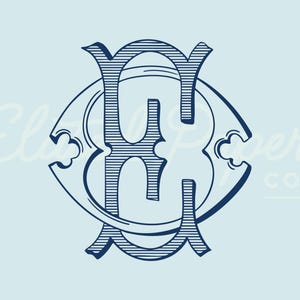 May include: A navy blue monogram design with the letters "EG" intertwined, set against a light blue background. The design features ornate, stylized lettering with decorative flourishes and the text "Elder Paper Co." in the upper left corner.