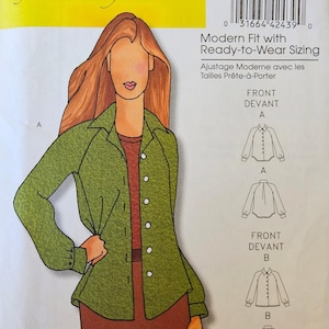 May include: A sewing pattern for a woman's jacket and dress. The pattern is labeled "B5261" by Butterick and Connie Crawford. The illustration shows a woman wearing a green jacket and a brown dress. The pattern includes sizing information.