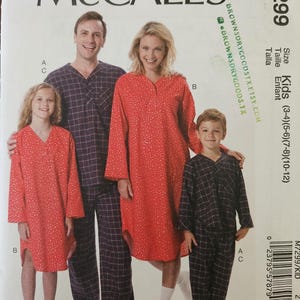 May include: McCall's pattern for family pajamas. The image shows a family of four wearing pajamas. The pajamas are red with white polka dots and navy blue plaid. The pattern includes sizes for kids.