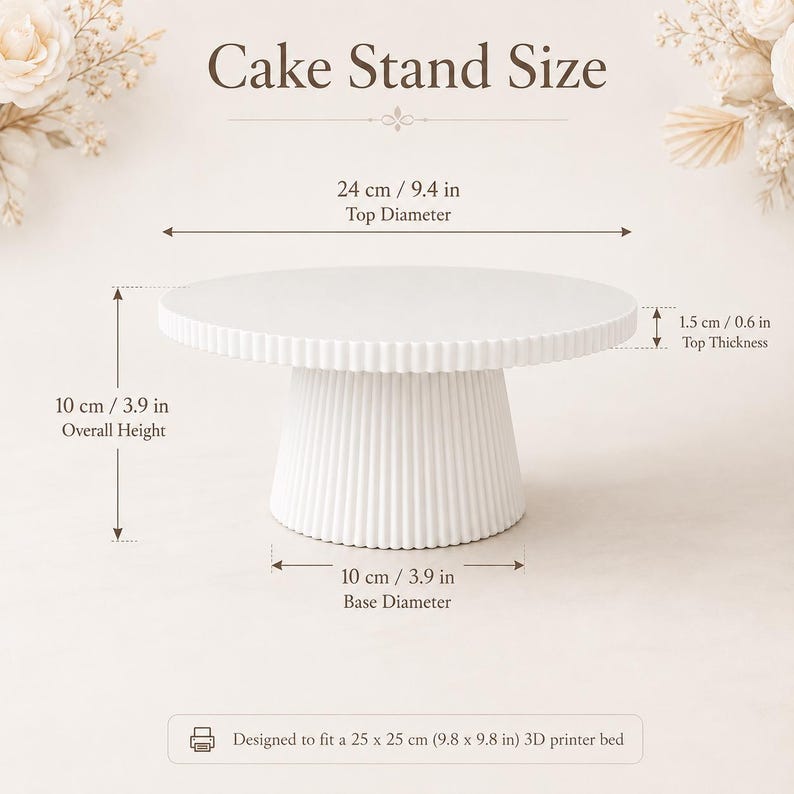 May include: A white cake stand with a fluted base and circular top. Dimensions are 9.4 inches top diameter, 3.9 inches base diameter, 3.9 inches overall height, and 0.6 inches top thickness. Text reads: Cake Stand Size and Designed to fit a 9.8 x 9.8 in 3D printer bed.