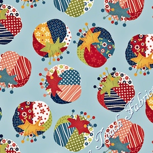 May include: Blue fabric with a repeating pattern of colorful patchwork circles. Each circle is made up of different fabrics with a star and pin design. The text "Sewing Touch Fabrics" is visible in the image. The scale is indicated by the text "1-1/4" in the bottom right corner.