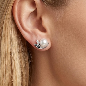 May include: A rustic wooden sign with the text "Welcome to our home" in a handwritten style. The sign features a distressed finish and a simple, inviting design, perfect for a front porch or entryway.