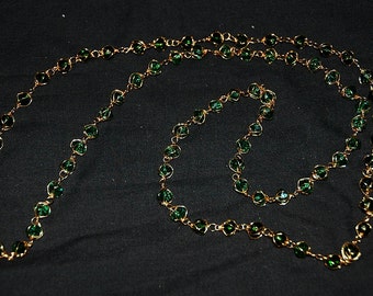gold plated emerald green caged crystal long necklace