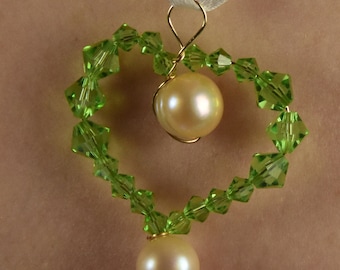 14 k gold green heart pendant